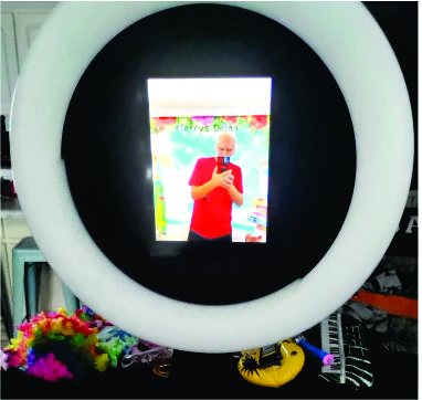 Close view of iPad photo booth with illuminated ring light