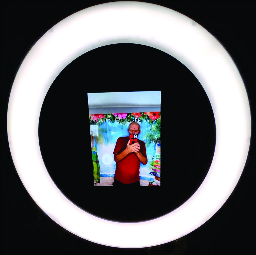 Fuqua Booths ring-light photo booth on tripod with scrim